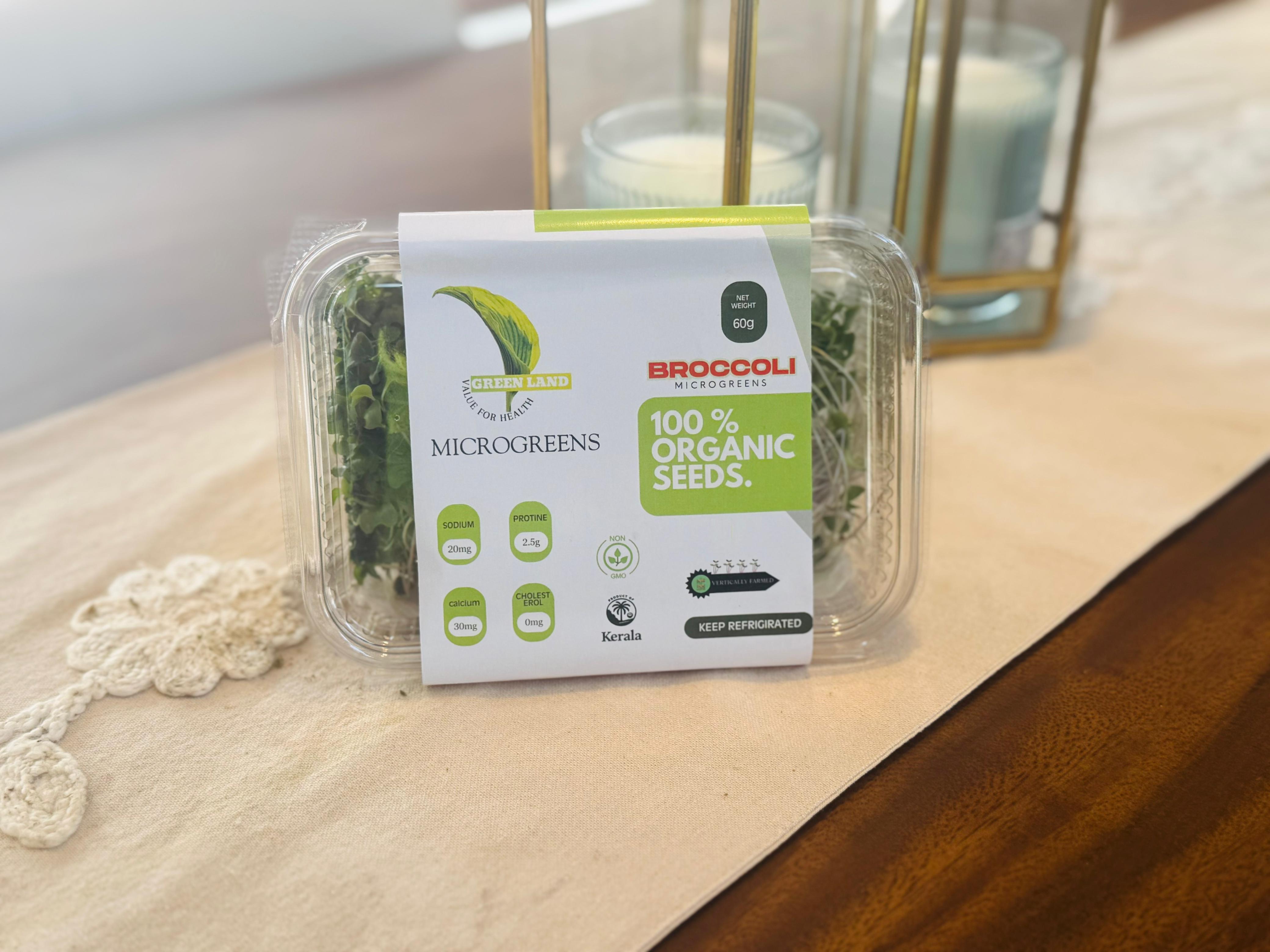 Hands holding fresh microgreens